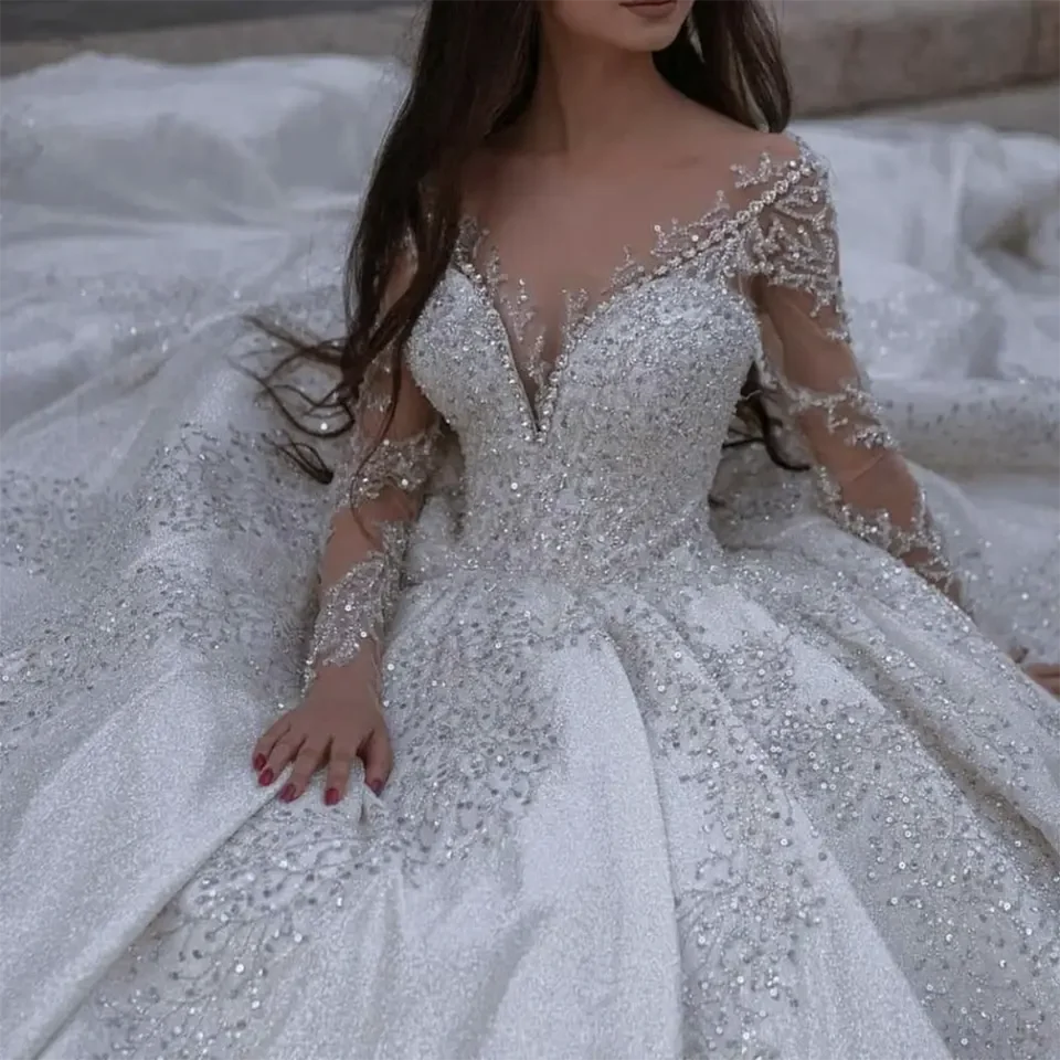 Customized New Luxurious Crystal Sequin Beaded Ball Gown Satin Wedding Dress Illusion Long Sleeves 2026 Court Train Bridal Gowns