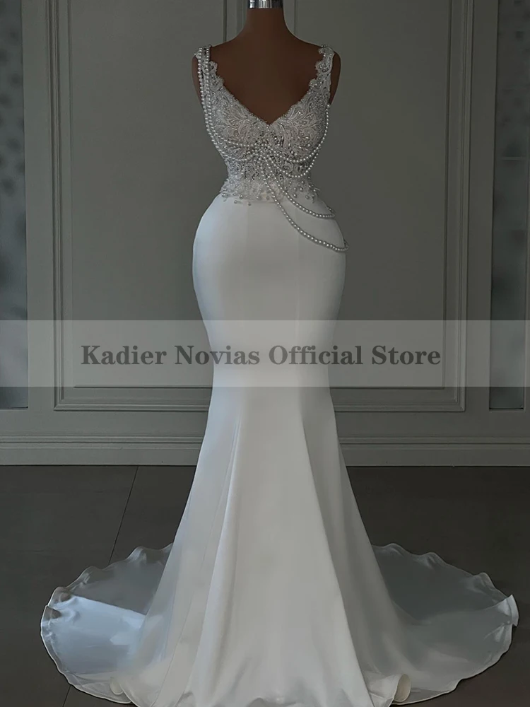 

Long White Mermaid Wedding Dresses with Pearl Tassel V Neckline Sleeveless Crystal Pearls Formal Bridal Gowns