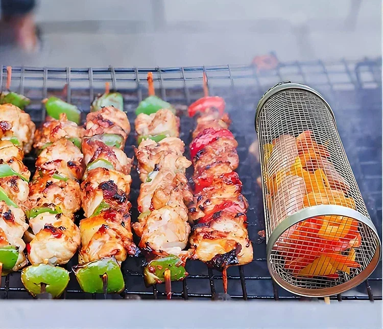 Stainless steel rolling grilling basket for outdoor barbecue mesh grilling.