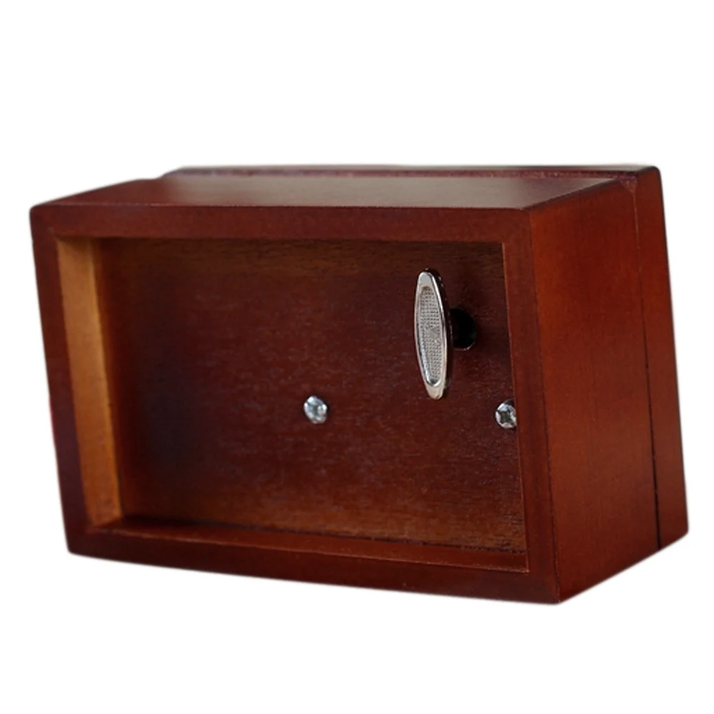 Mini vintage clockwork music box with melody of Castle In The Sky