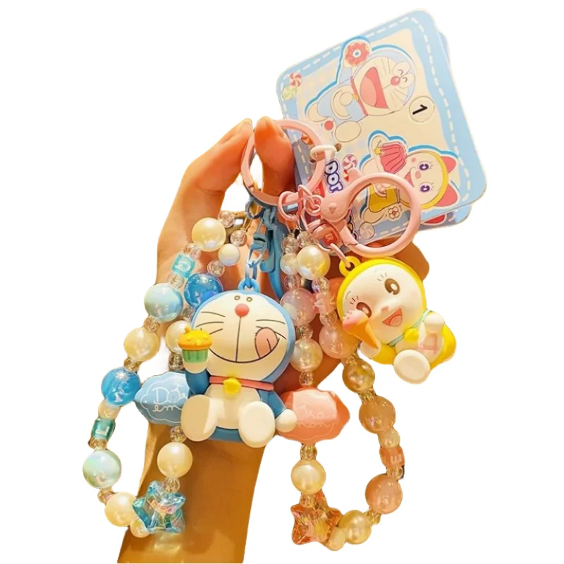 

2023 New Doraemon Kawaii Creative Bracelet Keychain Women's Exquisite School Bag Pendant Internet Celebrity Car Keychain Pendant