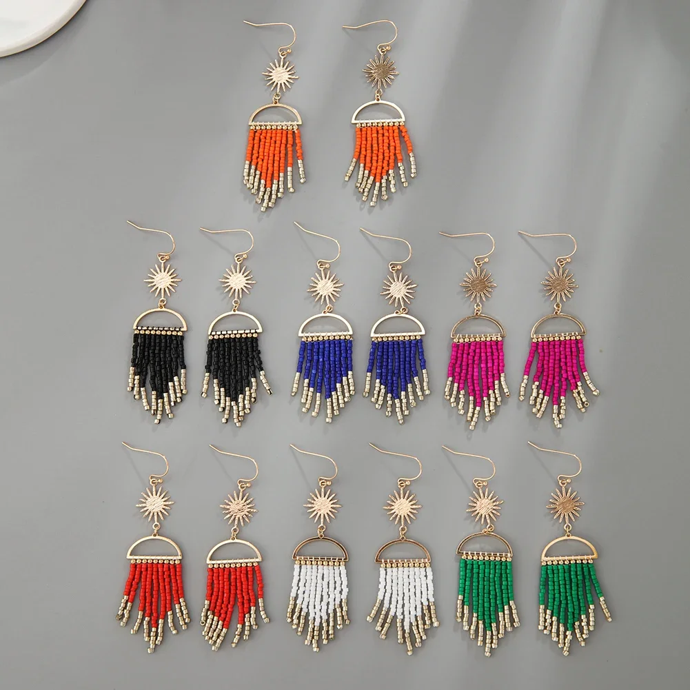 

Beaded earrings Sun Originality Geometry Retro Hand weaving Bohemia Alloy Tidal current Tassel Simplicity Rice bead earrings