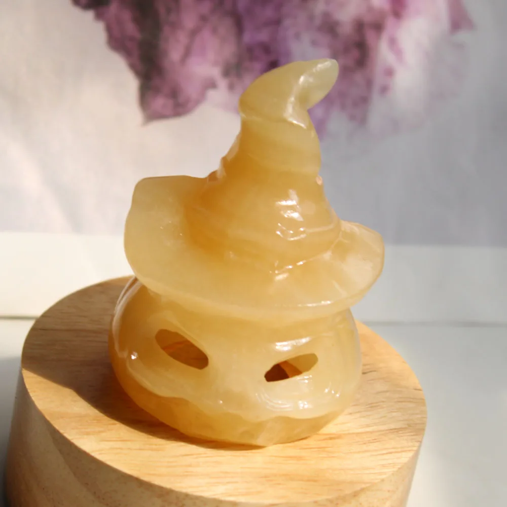 

Customized Cost Creative Natural Yellow Calcite Crystal Healing Hollow Out Wizard Pumpkin Ornament For Halloween Decoration