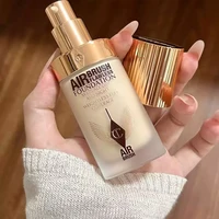 Charlotte Tilbury Poudre fixante lissante pour la peau, Fond de teint liquide compact, Flacon super finition, Contrôle du sébum, Embellisseur de la peau 4