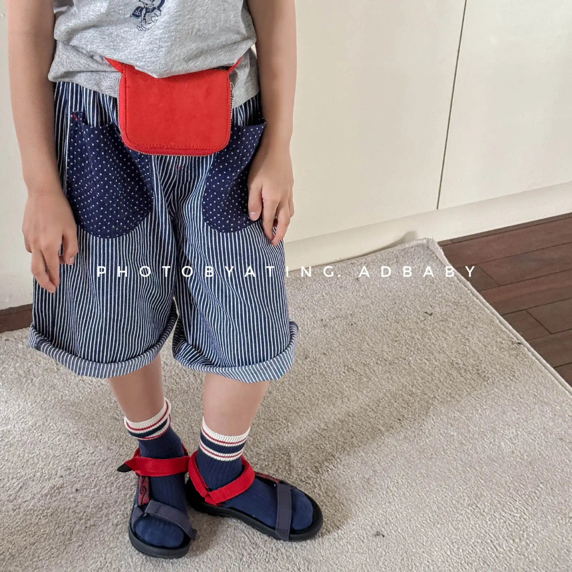 2025 صيف جديد الأطفال مخطط السراويل للبنين بنات فض...