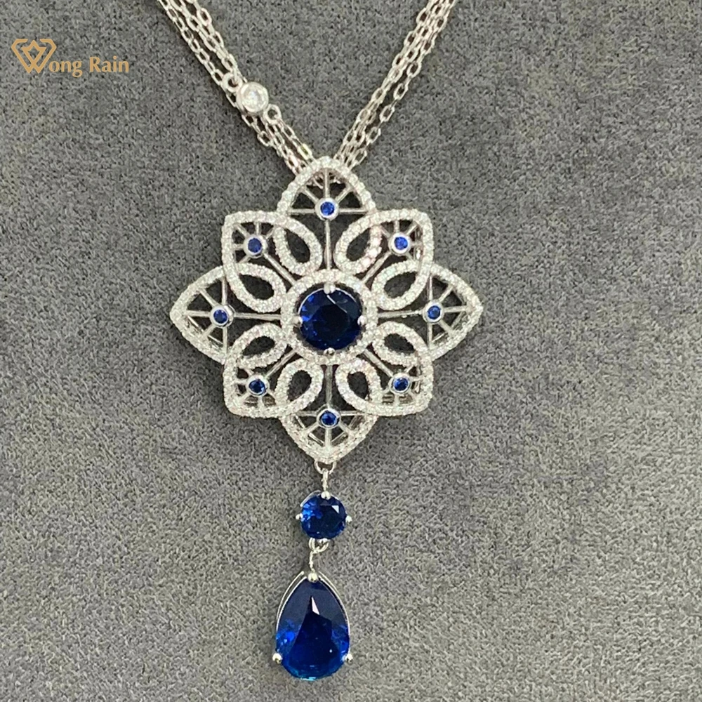 

Wong Rain 100% 925 Sterling Silver Pear Cut Sapphire High Carbon Diamond Gemstone Flower Pendant Necklace Fine Jewelry Gifts