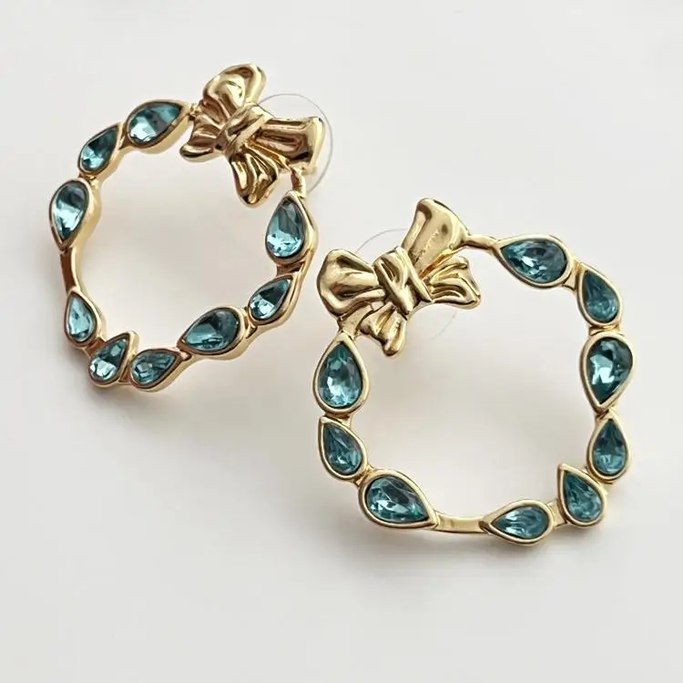 

European and American bowknot blue zircon circular earrings