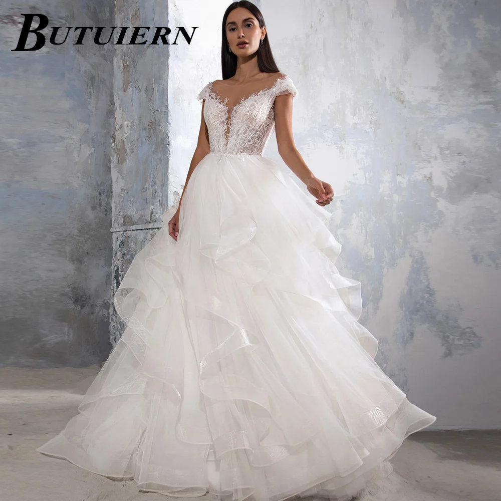 

COZOK сексуальное иллюзионное свадебное платье с аппликацией Многоярусное платье из тюля с круглым вырезом Алин свадебное платье с пуговицами сзади со шлейфом Индивидуальные