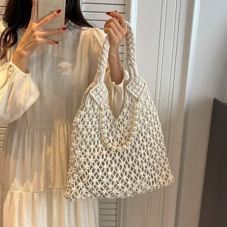thumbnail image 1 of Bolso de paja tejido de malla ahuecado de verano de marca de diseñador, bolsos de playa para vacaciones para mujeres, bolso de mujer, venta caliente, 1 of 4