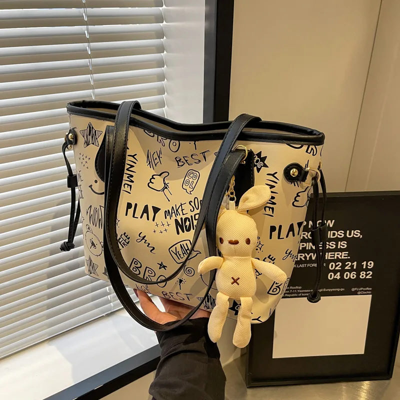 Tote Female Large Capacity Shoulder High Sense Big 2024 New Niche Graffiti Commuter Bag