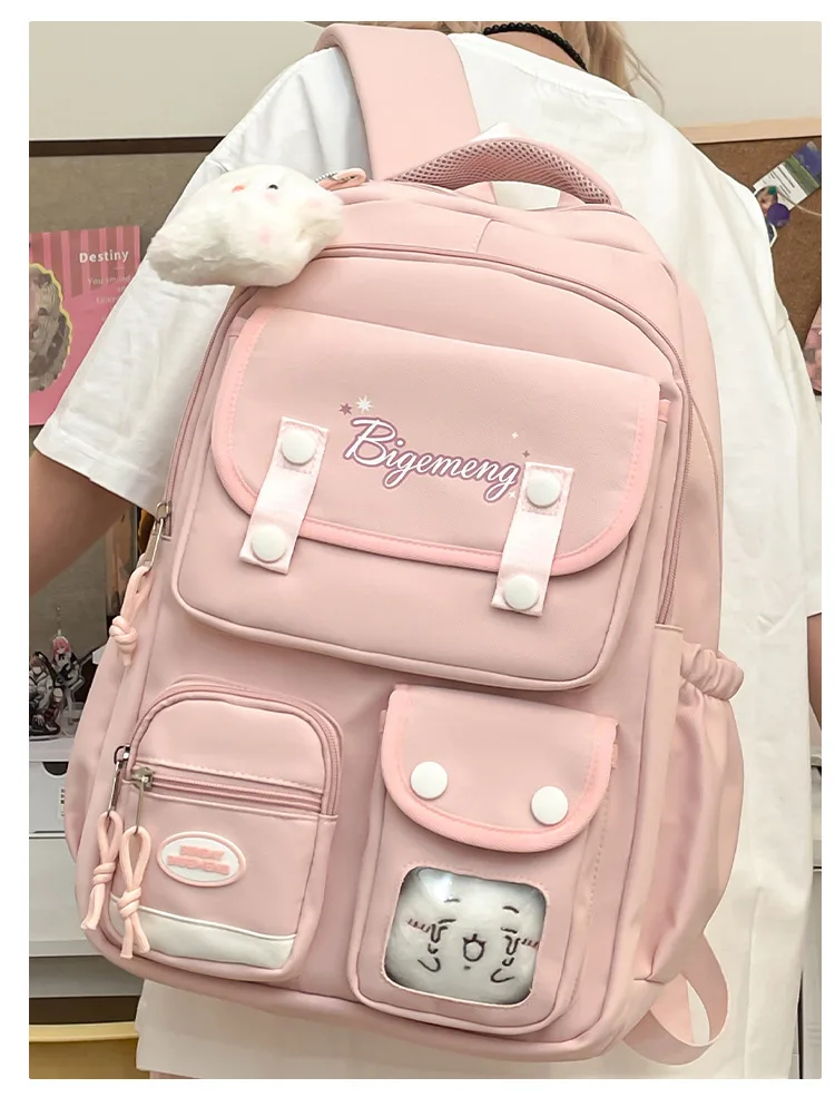 حقيبة ظهر جديدة لعام 2025 لطلاب المدارس الثانوية والمدرسة الابتدائية حقيبة ظهر مدرسية متعددة الاستخدامات مع دمية