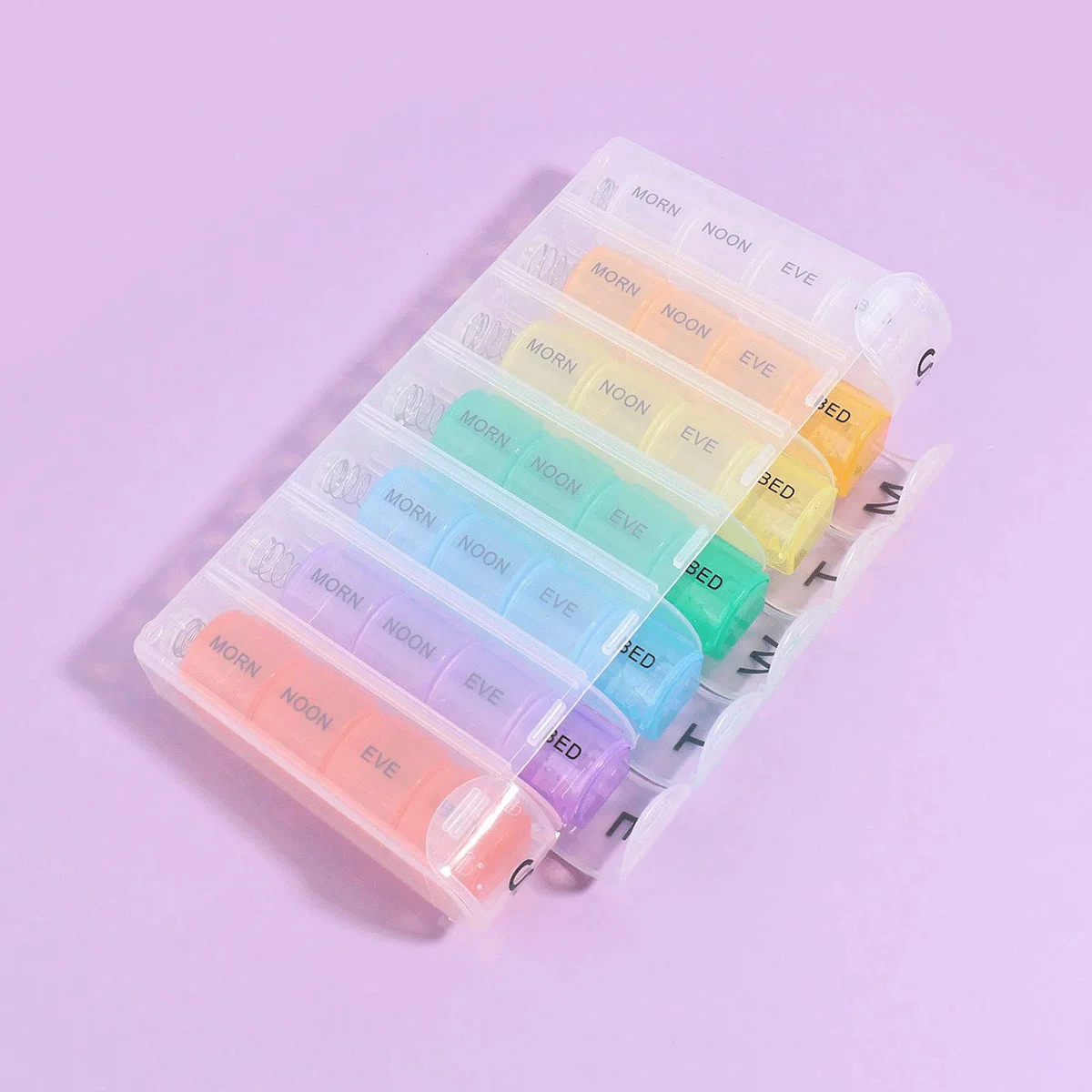 Portable 7-Day Multifunctional Pill Organizer with Spring Pop-Up Compartments