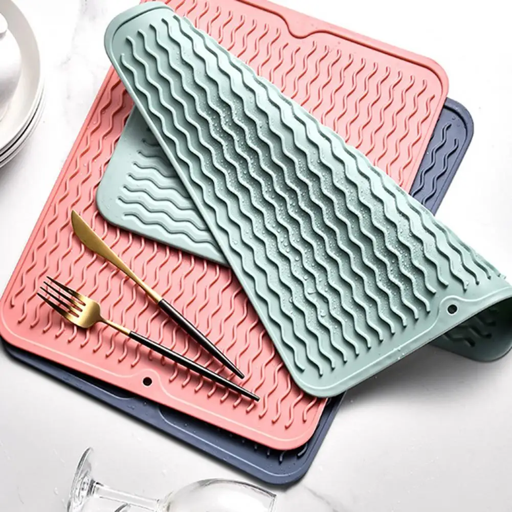 https://ae01.alicdn.com/kf/Sc2bdbf59c0dc4b17a8bb68bf8d67b913z/New-Silicone-Dish-Drying-Mat-Protection-Heat-Resistant-Tableware-Dishwasher-Mats-Sink-Mat-for-the-Kitchen.jpg