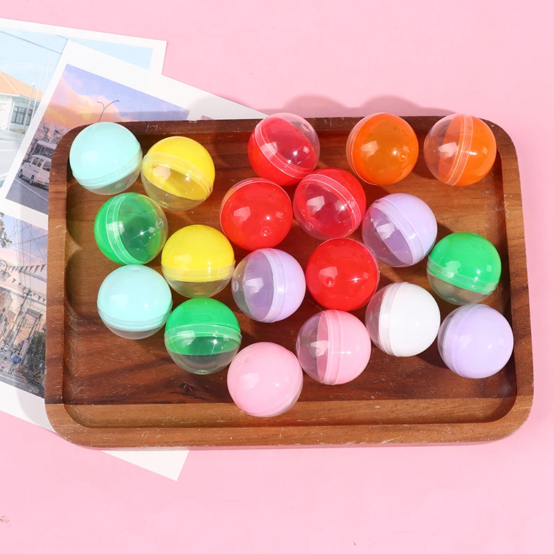 100Pcs 플라스틱 빈 장난감 판매 캡슐 하프 클리어 하프 컬러 라운드 볼