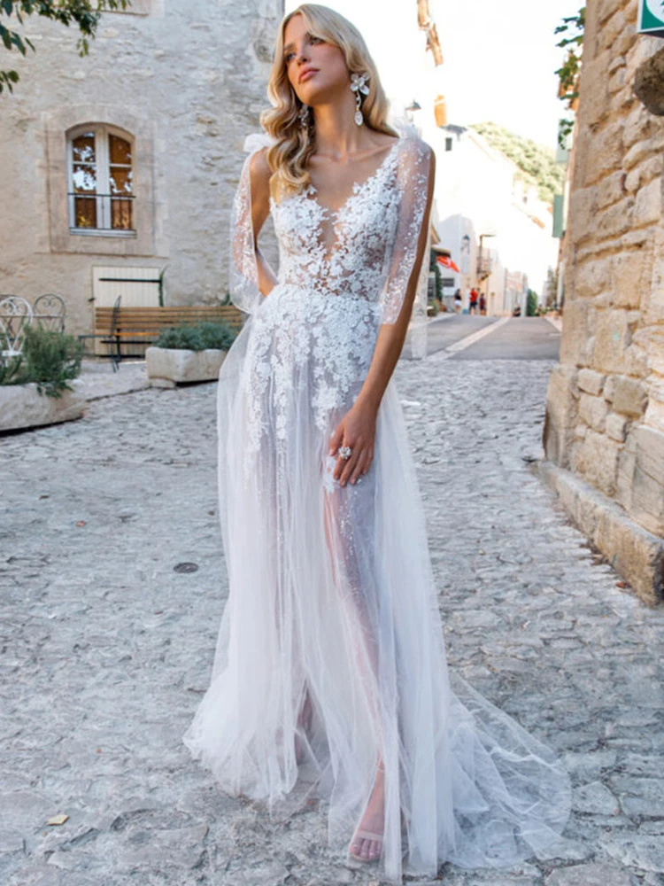 

Illusion Backless Wedding Gown 2023 Sexy Appliques Tulle Sweep Train Bridal Dresses Sleeveless Deep V-Neck Robe De Mariée