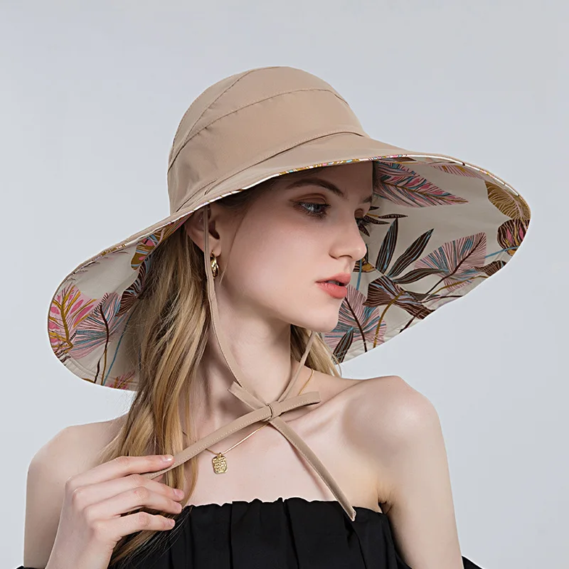 

sunshade hat for women with a half empty top that can be tied into a ponytail fisherman's hat and a large brim sunscreen hat