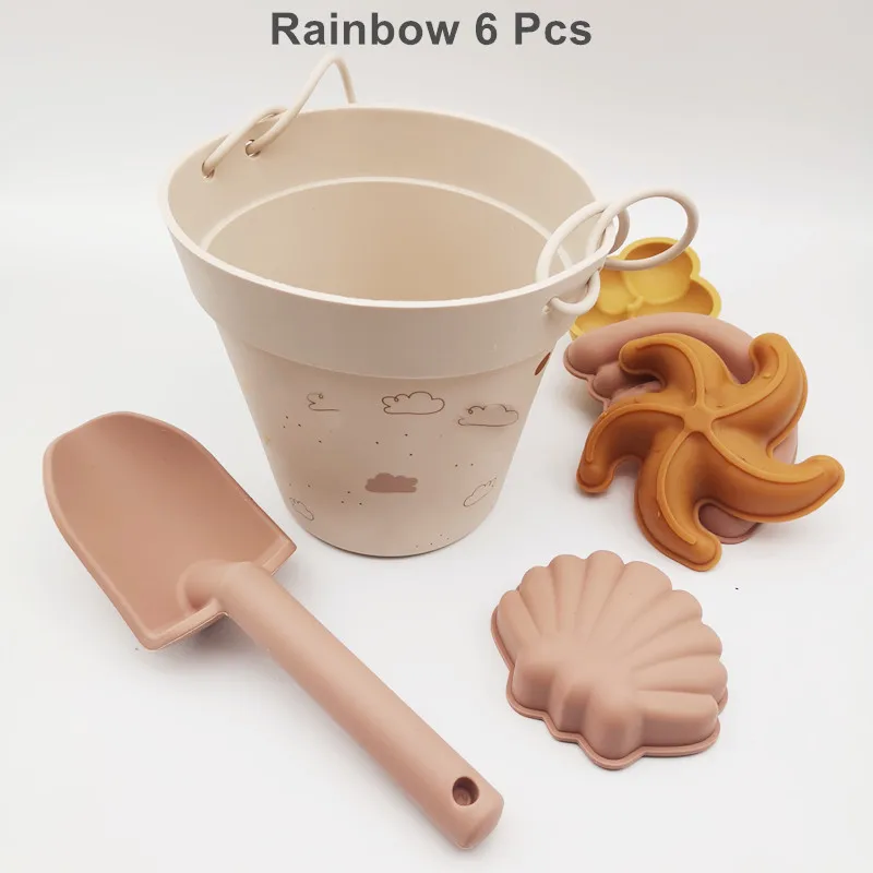 Set di giochi da spiaggia in silicone per bambini con secchiello_voghion.com