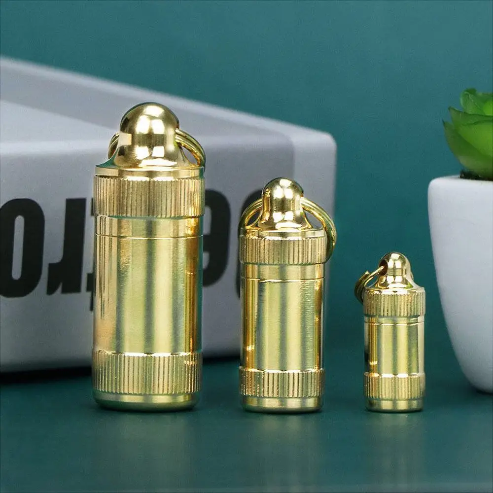 

Portable Brass Earplugs Capsule Camping Outdoor Accessory Travel Pill Case Medicine Bottle Keychain Holder Pill Storage Box