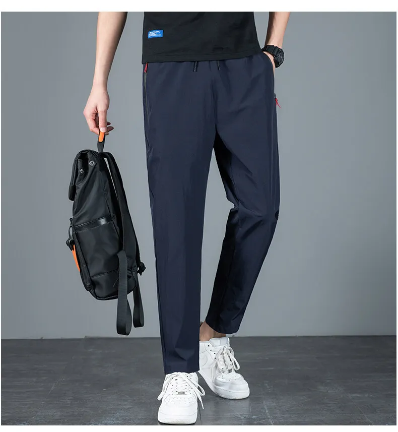 casual pants New Arrival Men's Elastic Waist Elastic Quick Drying Fabric Trousers Men Solid Harem Pant Ankle Length Thin Pants Male 918 casual joggers