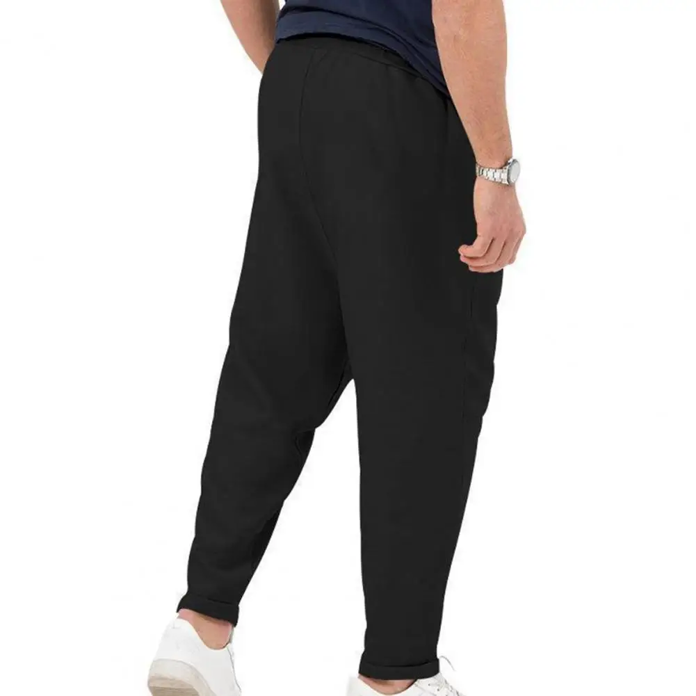 

Men Solid Color Pants Streetwear Harem Trousers Loose Fit Men's Solid Color Pants with Elastic Waistband Belt Pockets Adjustable