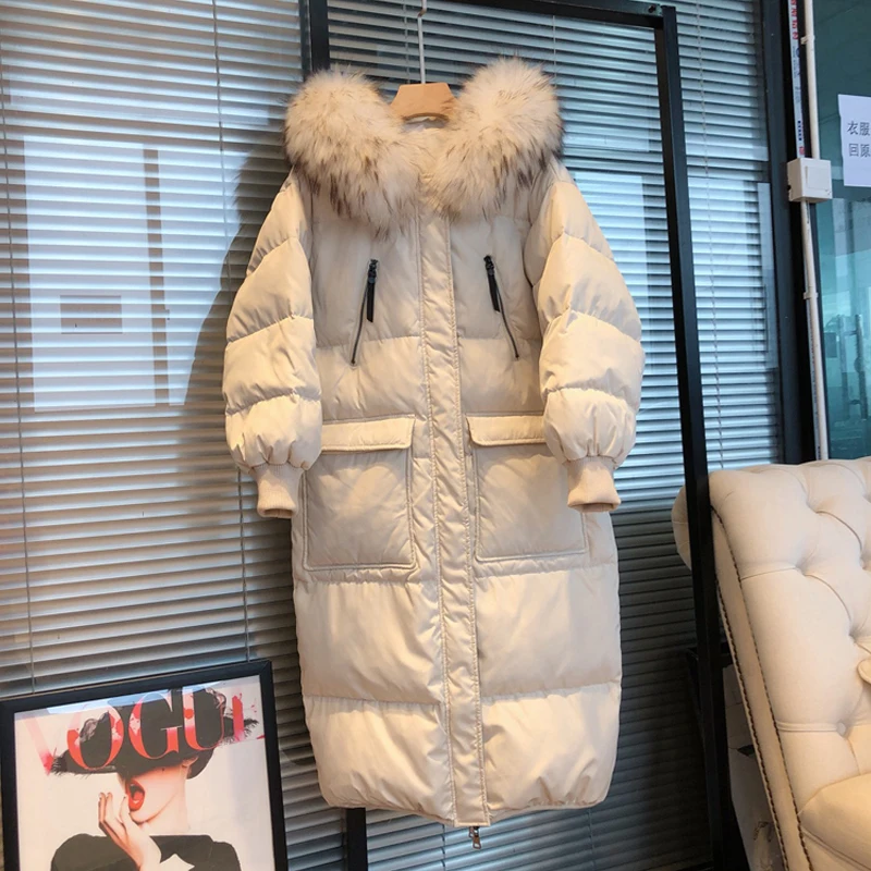 Рисунок 3 - Женский пуховик с воротником из меха енота