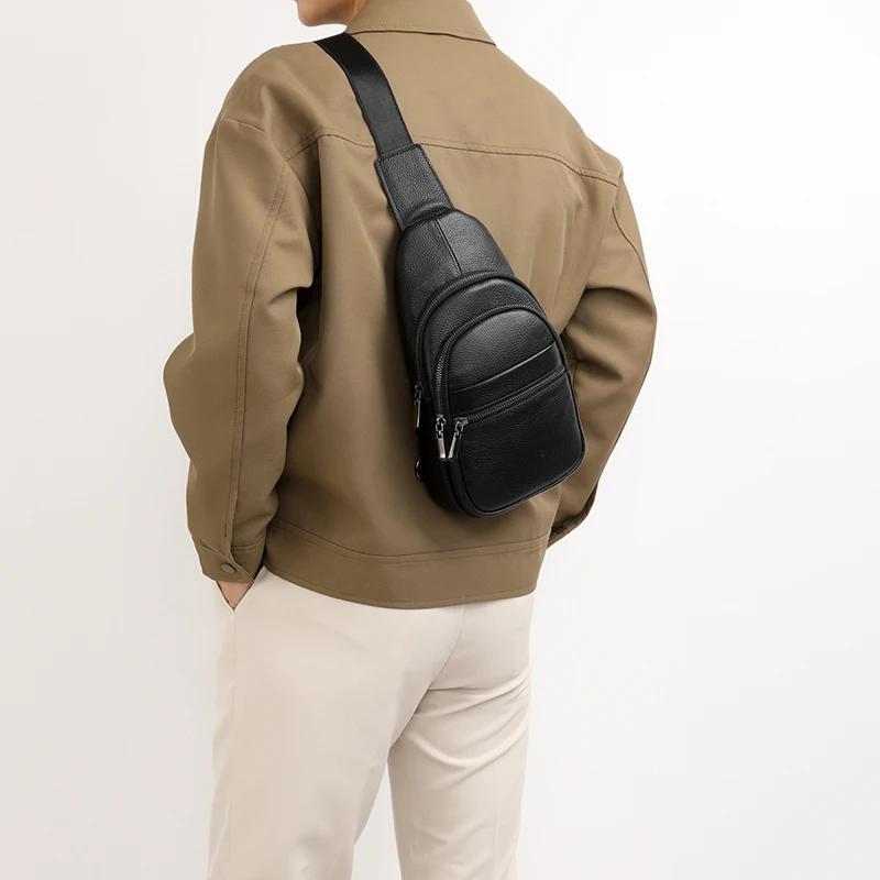 Stylish genuine leather sling bag for men with multiple compartments, ideal for everyday carry or travel