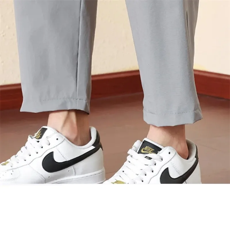 Men's Spring Summer Solid Pockets Drawstring Bandage Elastic High Waisted Casual Sports Small Leg Trousers Preppy Style Pants