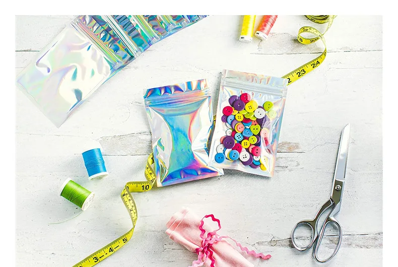 50 Pieces Self-Sealing Laser Small Plastic Bags for Jewelry Pouch with Clear Display Window Jewelry Packaging Gift Storage Bag