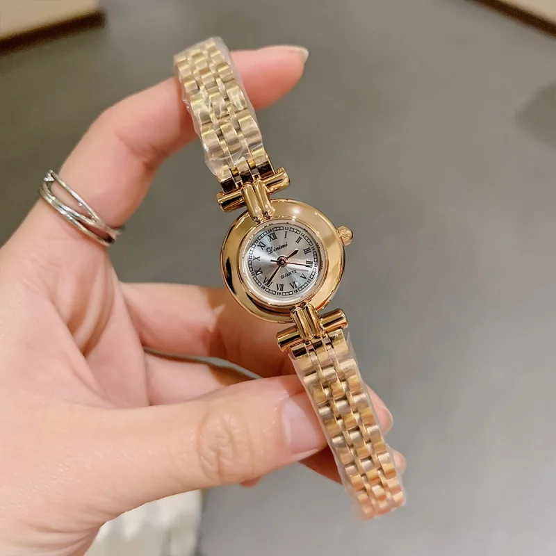 WOMEN'S watches fashion new fashion steel band wristwatch round disk vintage Roman simple quartz watch