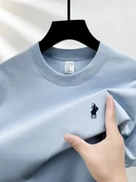 T-shirt pour homme à manches courtes et col rond 100% coton pur. Top respirant exquis de marque de luxe, best-seller de l'été, en tissu poney. 4