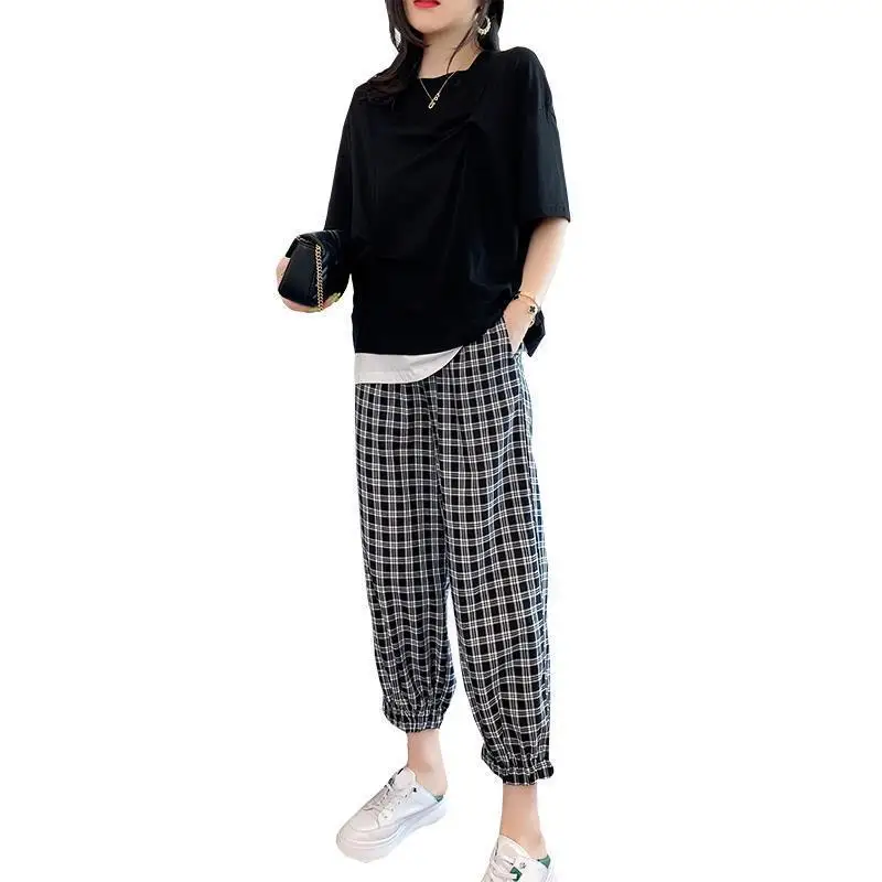 Large size 200kg women's fat women's pajamas casual summer and autumn can wear meat-covered plaid loose wide leg ankle-length pa