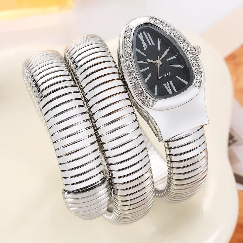 Serpentine Womens Quartz Watch: Diamond Inlaid Wrist