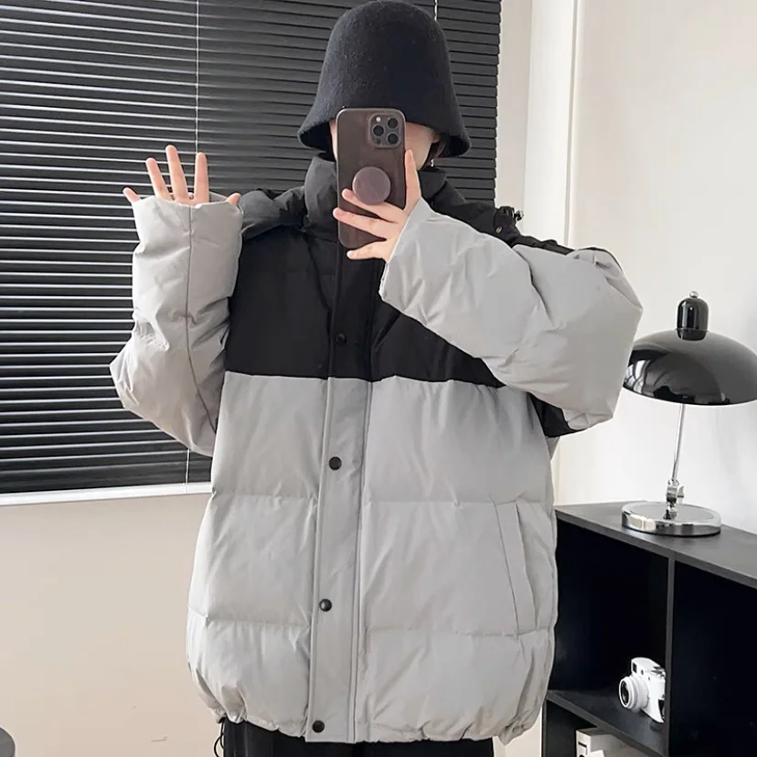 

Korean version contrasting color patchwork down jacket women's short 2023 new loose and thickened white duck down contrasting
