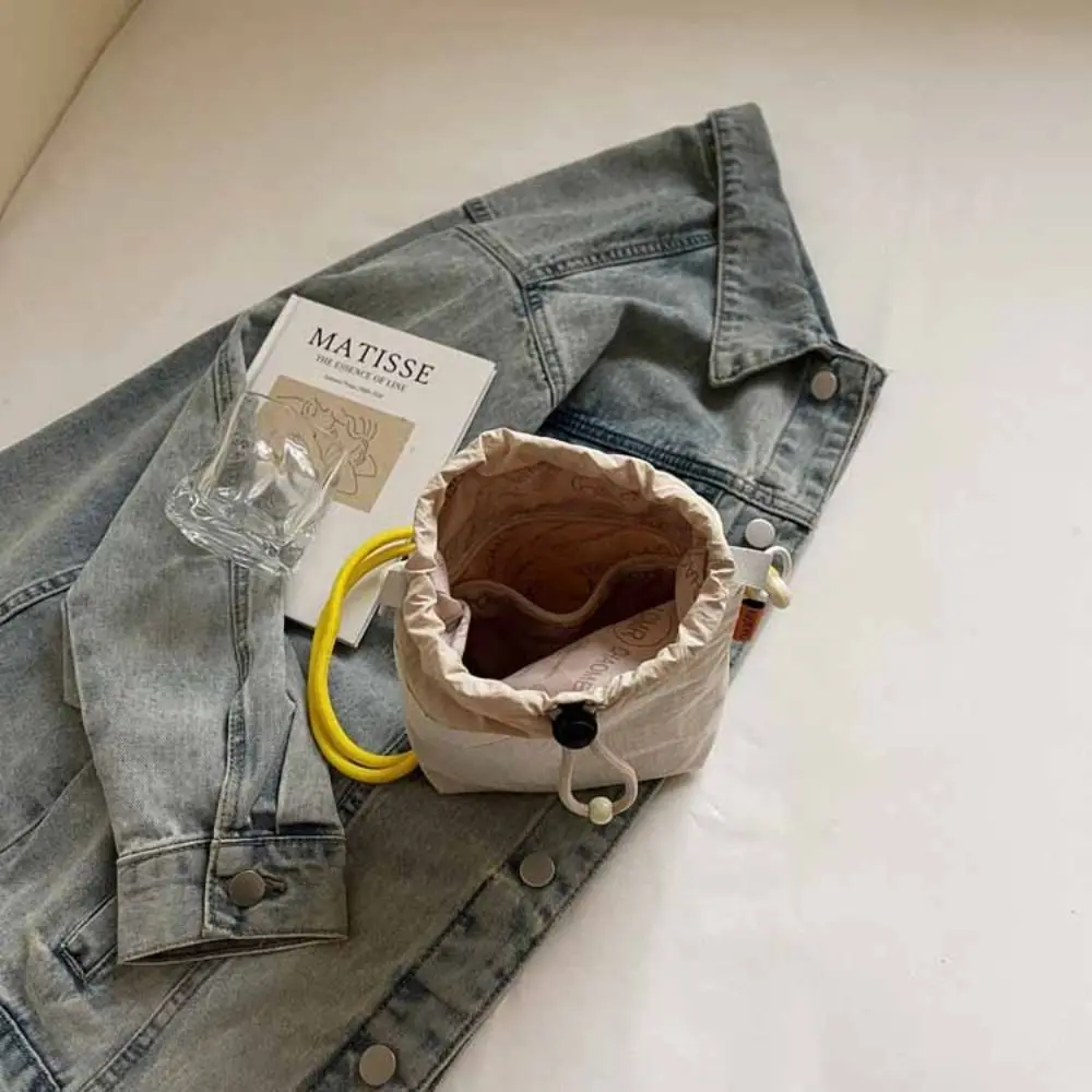 Borsa a secchiello piccola con tracolla e coulisse, in nylon ad asciugatura rapida, con portaborraccia, tasca frontale e manico, a tracolla - immagine 4