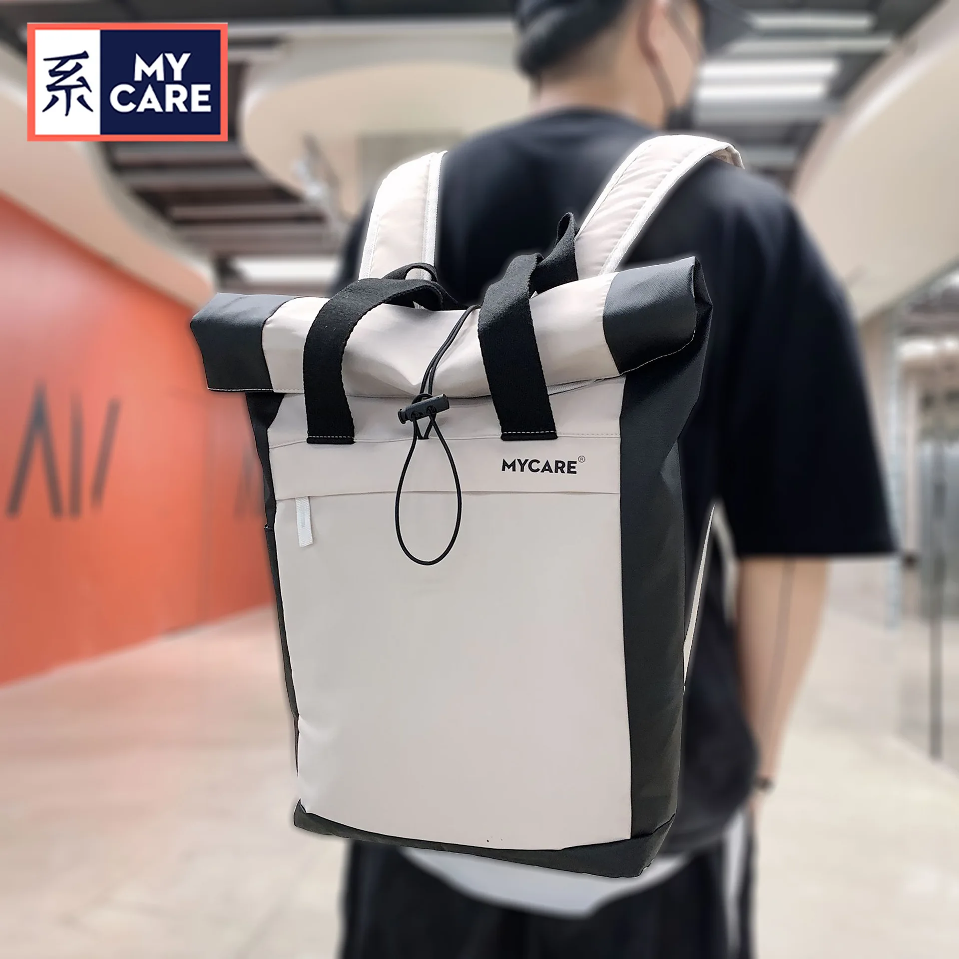 The new Korean version of the contrast color bucket backpack men's casual campus student backpack schoolbag backpack women