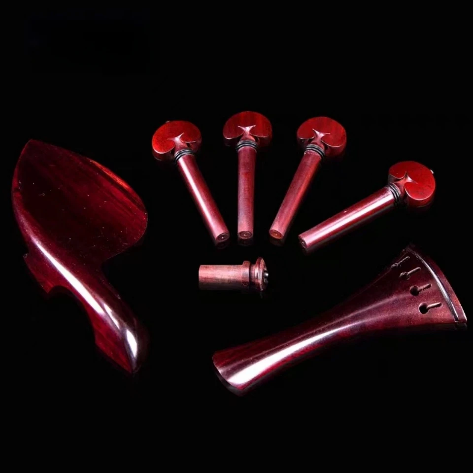 

4/4 violin old mahogany accessories, mahogany tailpiece, spool, peg, tail post, tail button, cheek drag, complete set