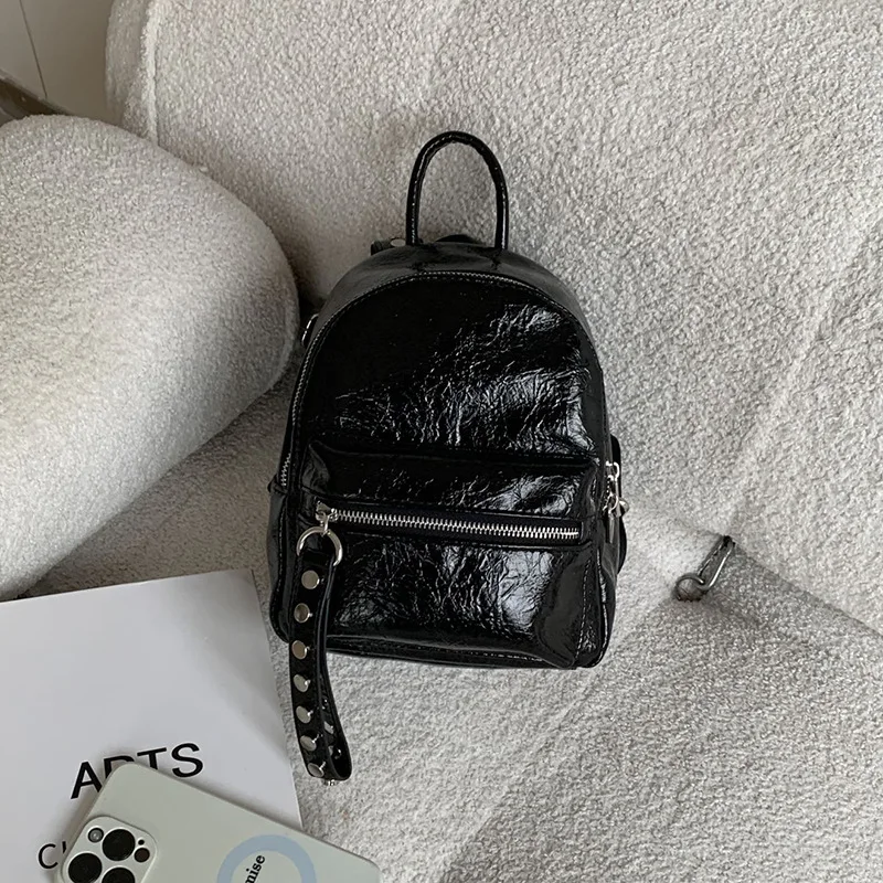 Stylish Small Backpack for Women with Rivet Accents for Daily Commuting