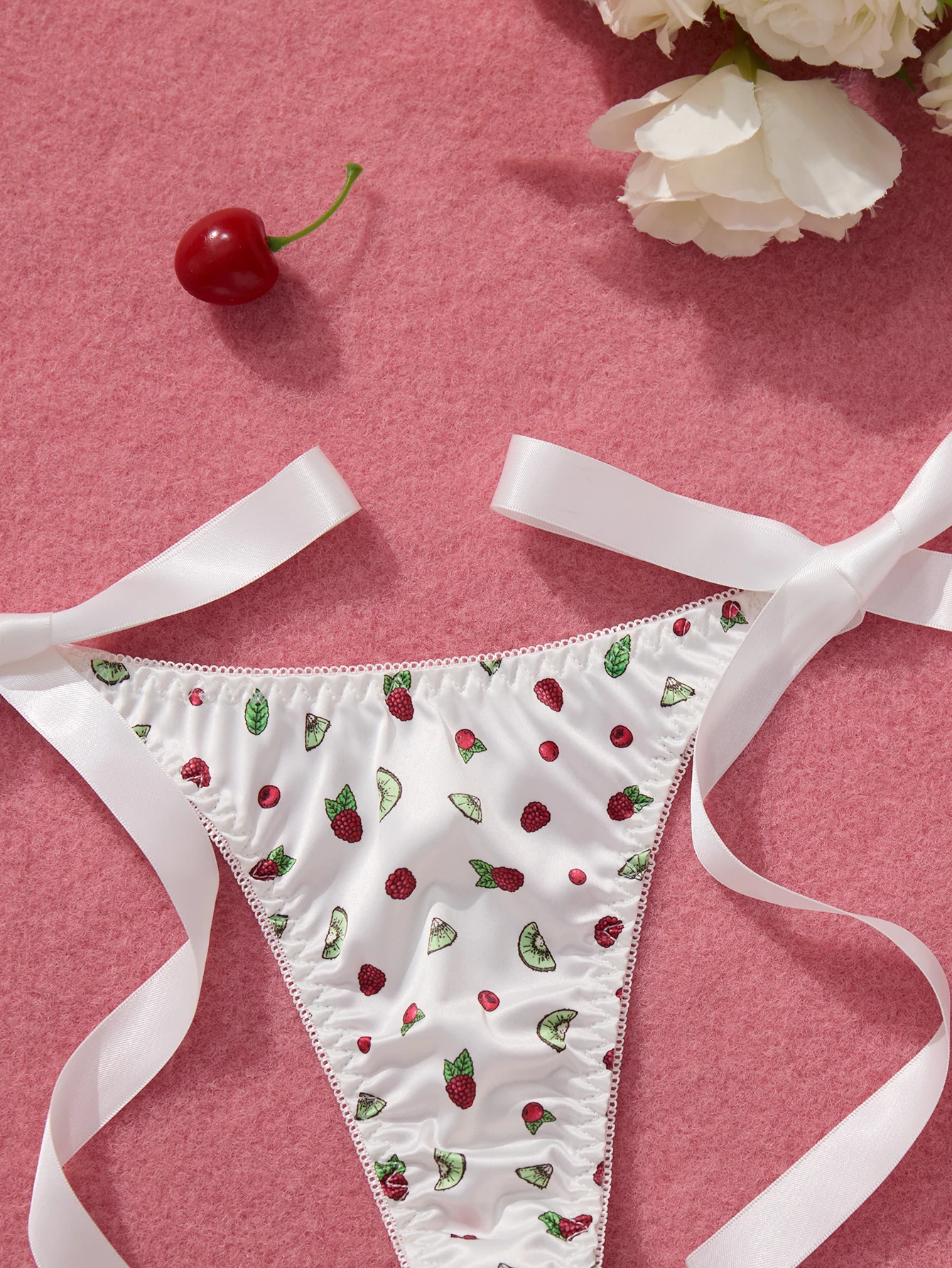 tie side G-string flat lay