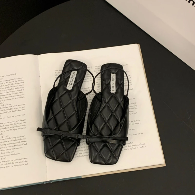 2024 new niche French black open-toed sandals for women summer bow soft soled beach Roman shoes