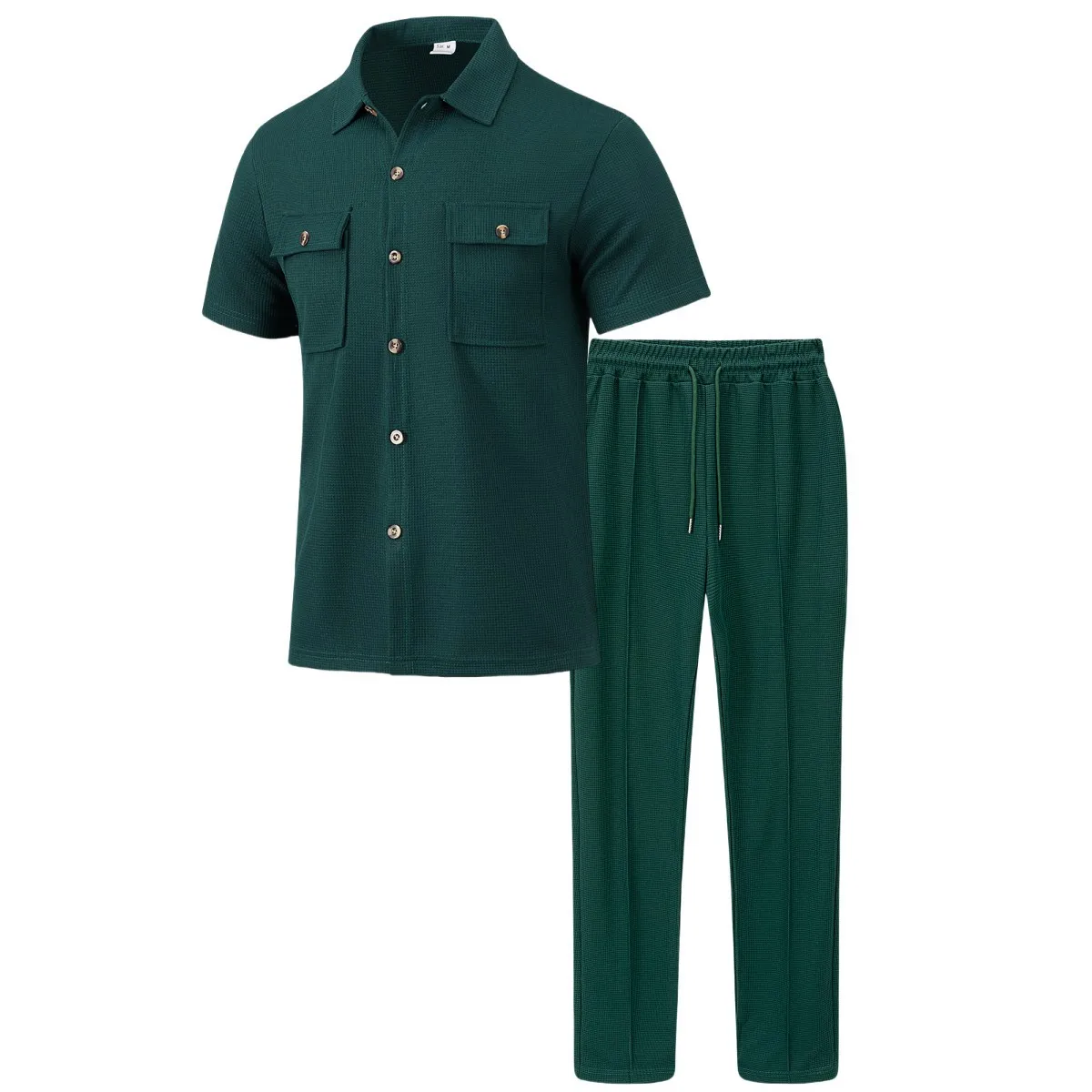 Men’s solid color waffle check short sleeve shirt and trousers two-piece set displayed on model in outdoor travel setting green 2