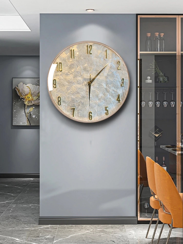 

Light luxury shell wall clock 2024 new wall watch living room home clock modern simple creative atmosphere wall clock