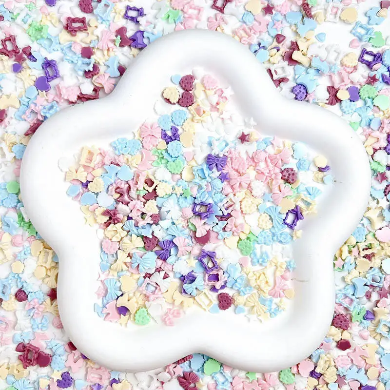 50PCS 3D 마카롱 하트 보우 네일 매력 수지 나비 꽃 네일 아트 장식 액세서리 DIY 매니큐어 공예품