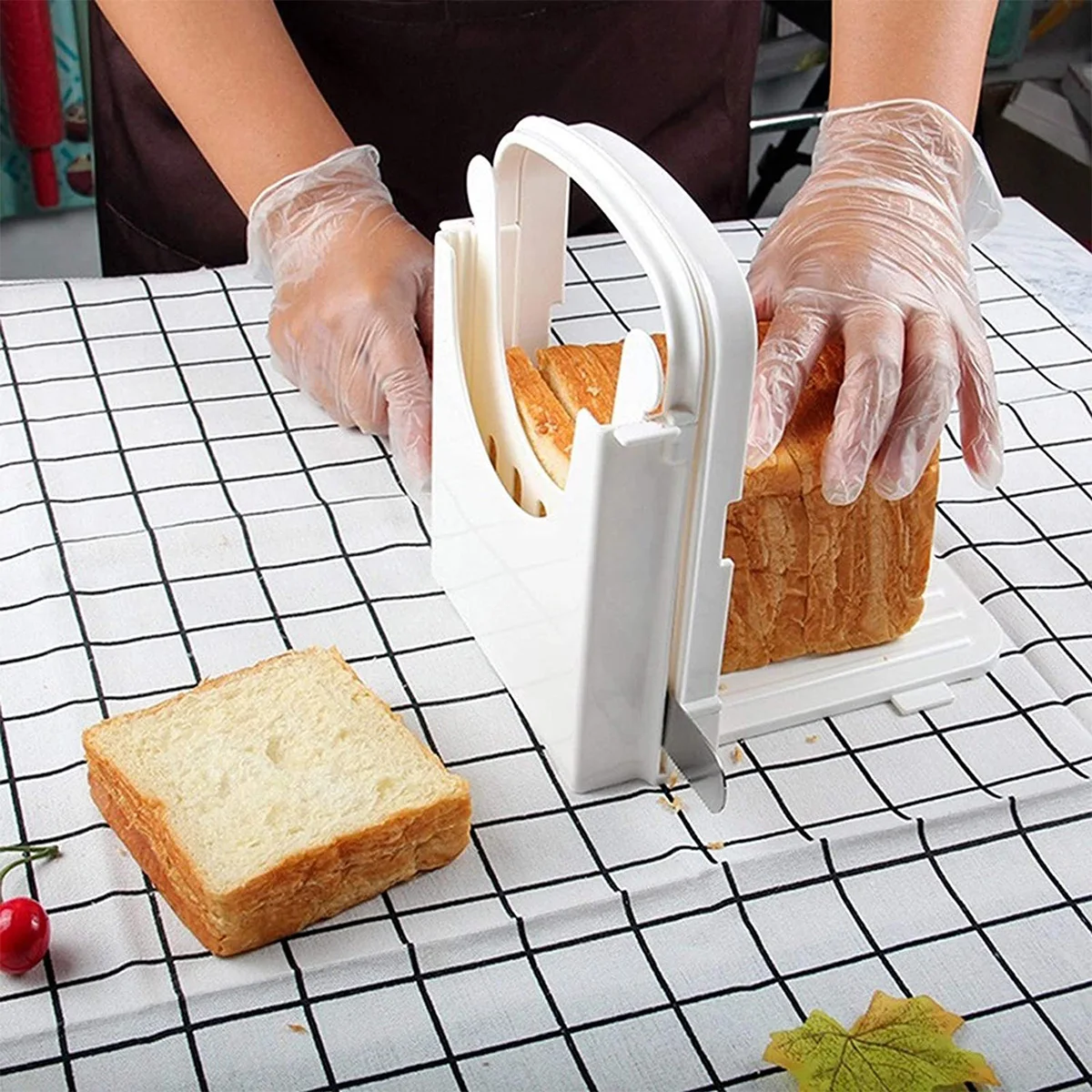 https://ae01.alicdn.com/kf/Sc3e3f344046b4184b33866a6ca4c890at/Collapsible-bread-slicer-adjustable-toast-slicer-tool-plastic-bread-cutting-guide-Homemade-bread-kitchen-baking-tool.jpg