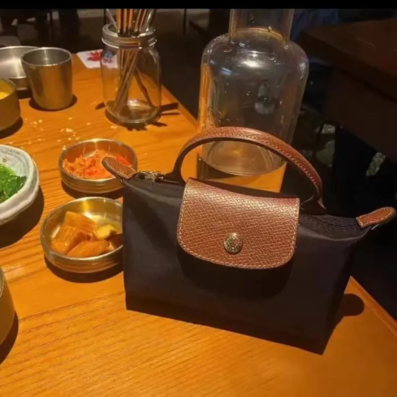 

Versatile Handbag Mini Dumpling Bag Fashionable Women's Mobile Phone Mini Change Makeup Bag New Handbag