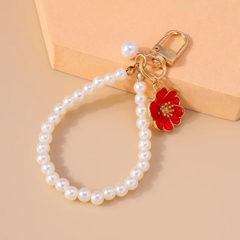 Modischer Schlüsselanhänger mit Imitationsperlen und Emaille-Blumenanhängern für Damen und Herren, Autoschlüssel, Handtaschen-Schlüsselanhänger, DIY-Geschenke – Detail 5