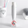 Toothpaste Squeezer Tooth Paste Holder Oral Care Bathroom Tools Tube Cosmetics Press Facial Cleanser Rolling Squeezing Dispenser 2