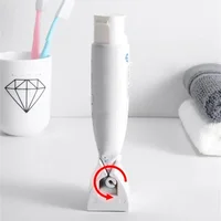 Toothpaste Squeezer Tooth Paste Holder Oral Care Bathroom Tools Tube Cosmetics Press Facial Cleanser Rolling Squeezing Dispenser 2