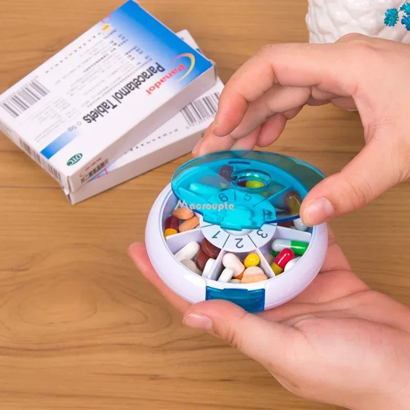 Compact Blue Rotating Pill Organizer - Travel-Friendly Weekly Medicine Case