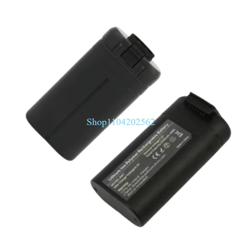 Deux batteries rechargeables pour drone Mini 1 côte à côte, autonomie améliorée.