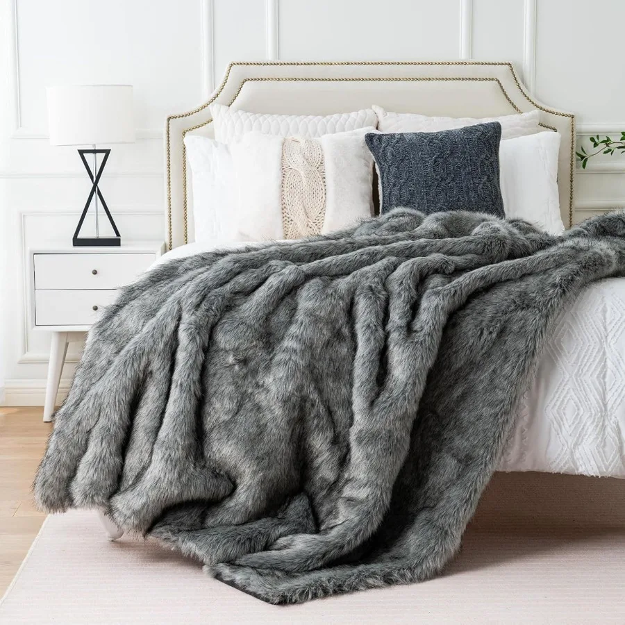 Extra large faux fur blanket perfect for couch or bed super soft and fluffy with elegant grey color featuring black tips revers